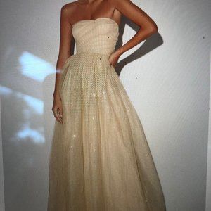 Sparkle in this Cream and Gold Glitter Maxi Dress